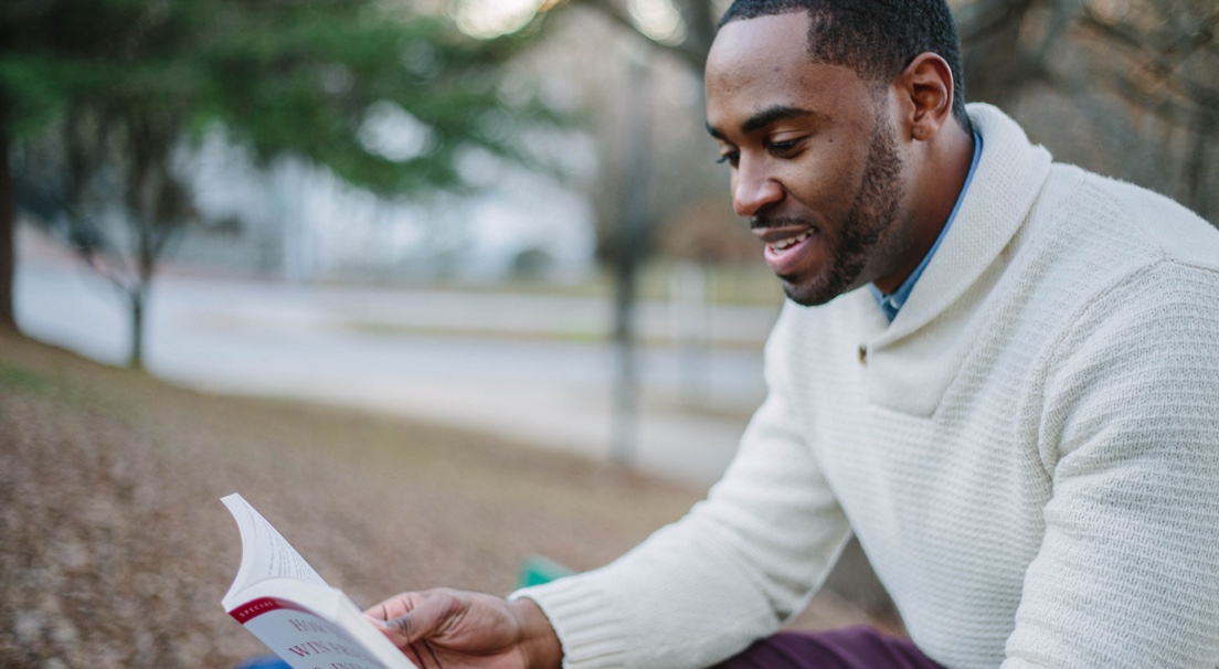 Student reading a book